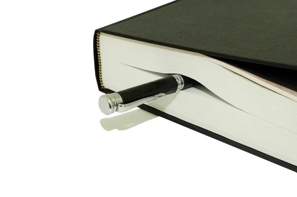 Zwarte pen en grote boek — Stockfoto