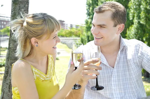 Young couple with champagne — Stock Photo, Image