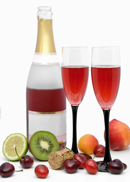 Champagne och frukt — Stockfoto
