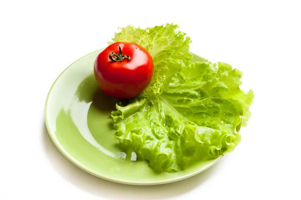 stock image Tomato and lettuce on a dish