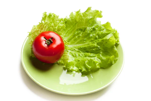 stock image Tomato and lettuce on a dish