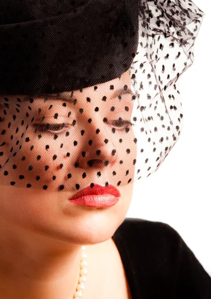 Donna affascinante in un cappello — Foto Stock