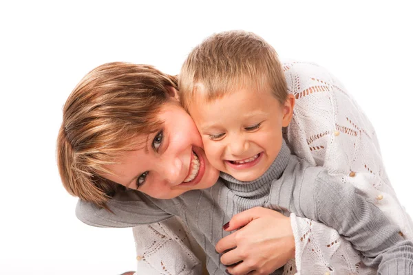 Encantadora Mujer Con Hijo Sobre Fondo Blanco —  Fotos de Stock