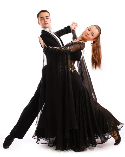 Очаровательная пара танцует в красивых костюмах — стоковое фото