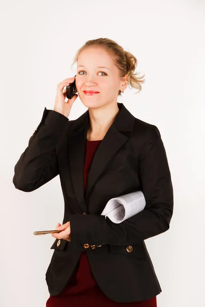 文書および電話白い背景の上のフォルダーを持つ女性実業家 — ストック写真
