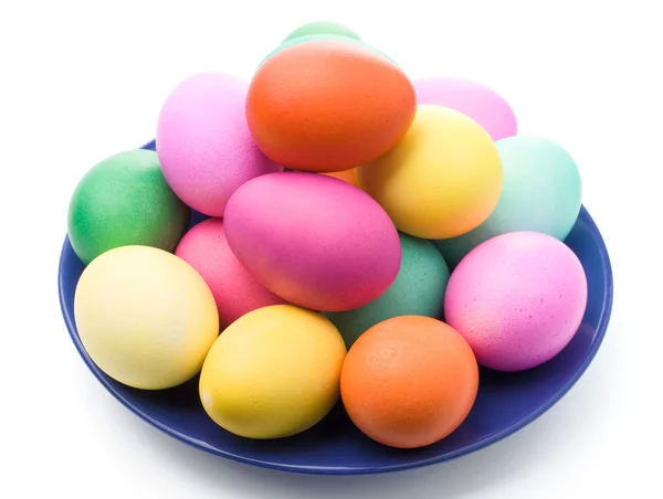 stock image Easter eggs on blue plate isolated on white