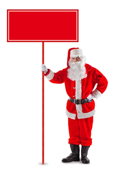 Santa claus permanent met een teken — Stockfoto