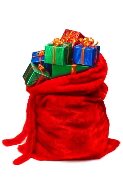 Мішок Санта-Клауса, наповнений подарунки — стокове фото