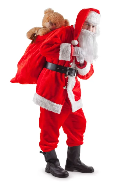 Стоїть Санта з мішком подарунків — стокове фото