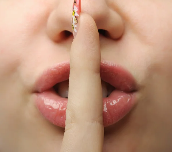 Finger at a mouth — Stock Photo, Image