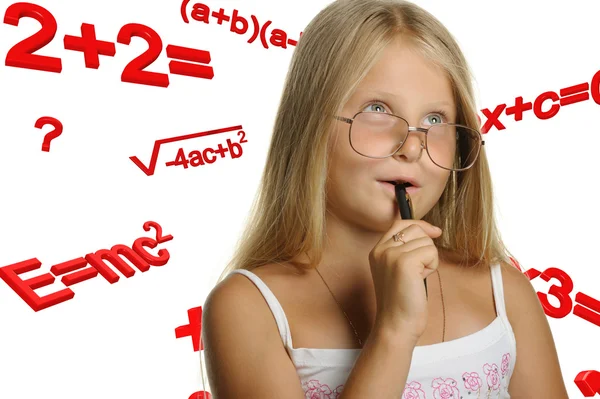 Das Mädchen und mathematische Formeln — Stockfoto
