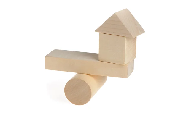 Maison en bois sur des échelles abstraites — Photo