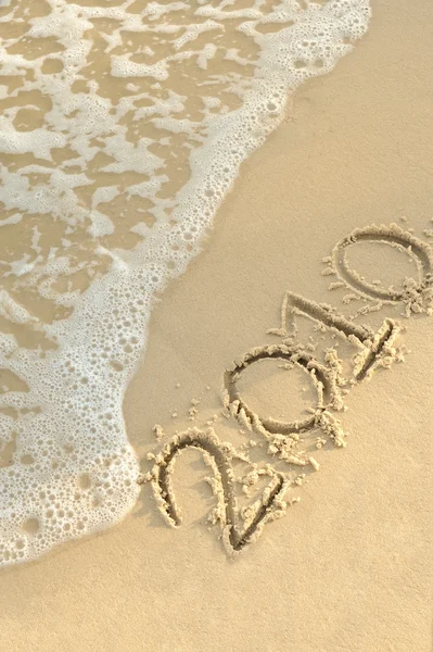 在沙滩上的铭文"2010 年" — 图库照片
