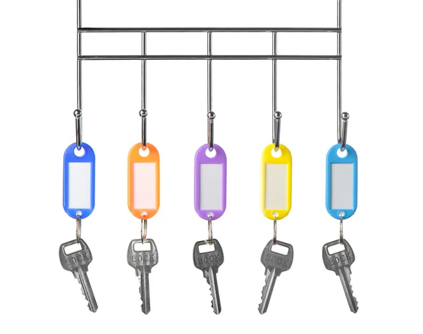 Keys with color trinkets — Stock Photo, Image