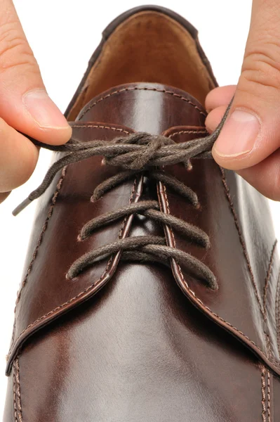 To fasten bootlace on shoes — Stock Photo, Image