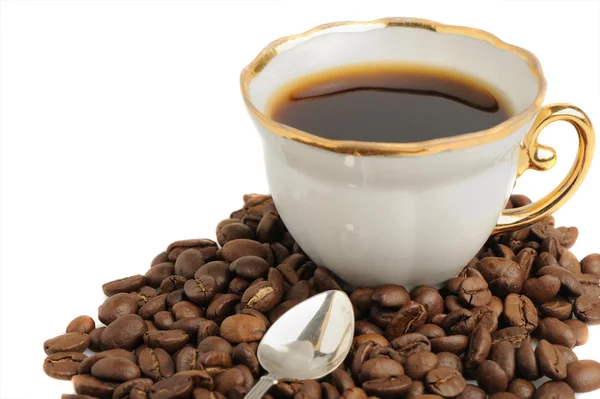 Gümüş kaşık ve tohum ile şık kahve fincanı — Stok fotoğraf