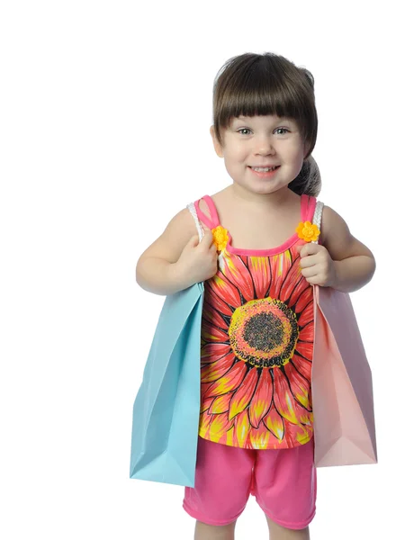 The little girl with color package — Stock Photo, Image