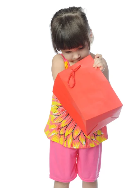The little girl with surprise package — Stock Photo, Image