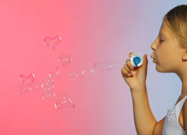 The pretty girl with bubbles heart — Stock Photo, Image