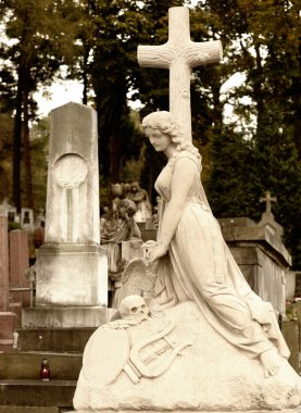 Tombstone women with a cross clipart