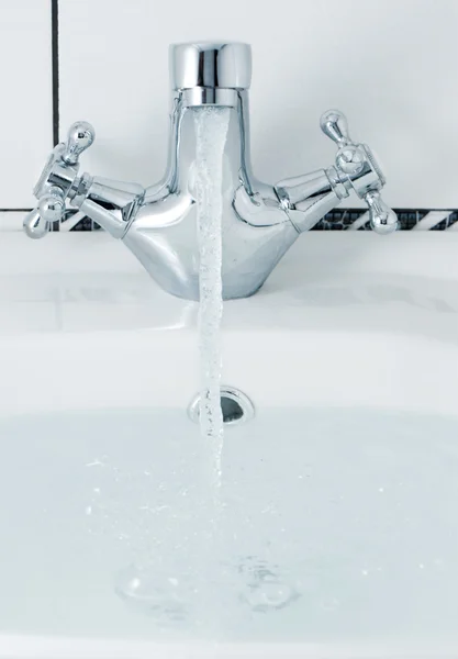 Tap with a water stream. — Stock Photo, Image