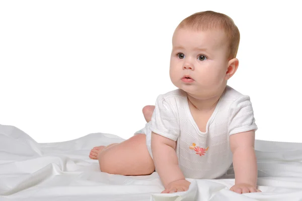 The baby on a bedsheet — Stock Photo, Image