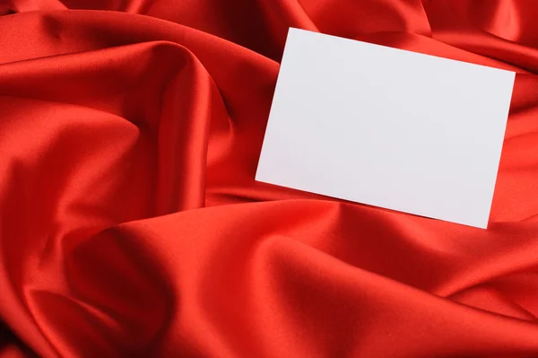 Poznámka: na červené hedvábí — Stock fotografie