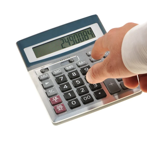 The calculator and a hand of the man — Stock Photo, Image