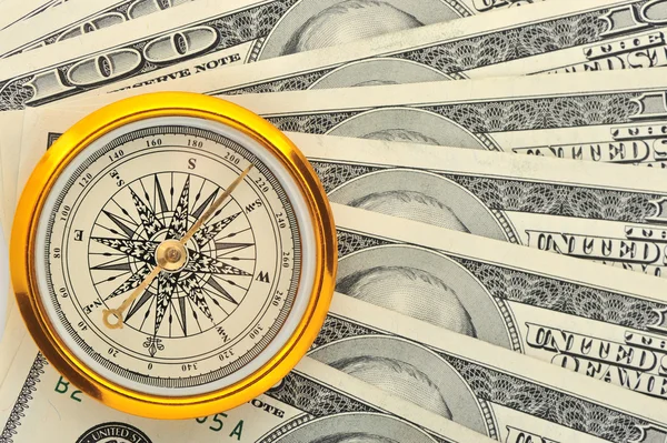 Dollars and compass — Stock Photo, Image
