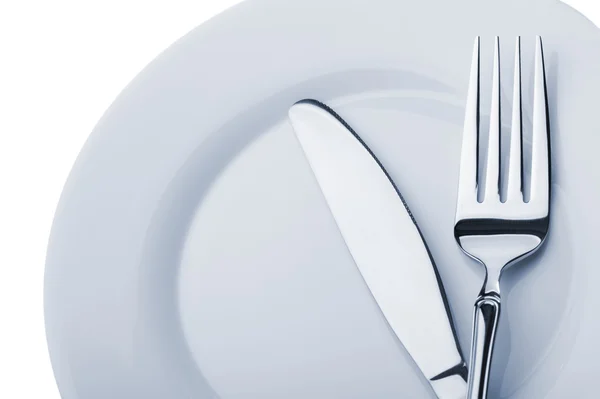 접시 위의 칼과 포크 — 스톡 사진