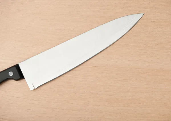 Knife and board for cutting food — Stock Photo, Image