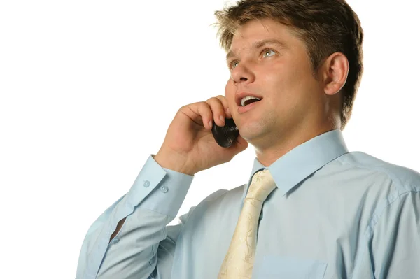 Affärsmannen talar av en mobiltelefon — Stockfoto