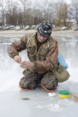 Fisherman. ice fishing competition clipart