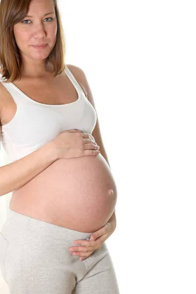 Беременная Женщина Улыбается Белом Фоне — стоковое фото