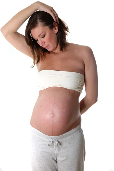 Giovane donna con gravidanza-pancia — Foto Stock