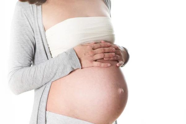 Детский живот беременной женщины — стоковое фото