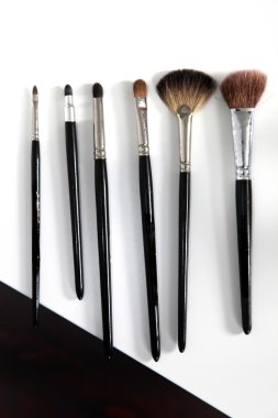 Different make - up brush in a row clipart