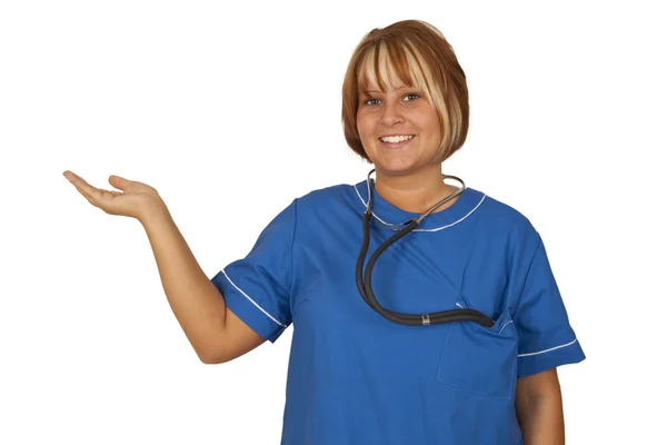 Mooie verpleegster houden iets — Stockfoto