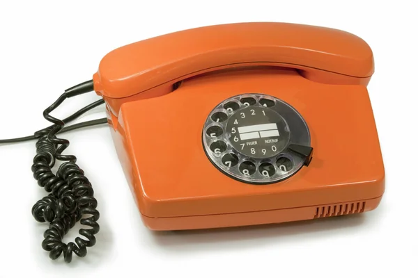 Старий телефон помаранчевий — стокове фото