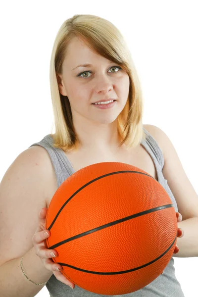ボールを持つ若い女 ストック画像