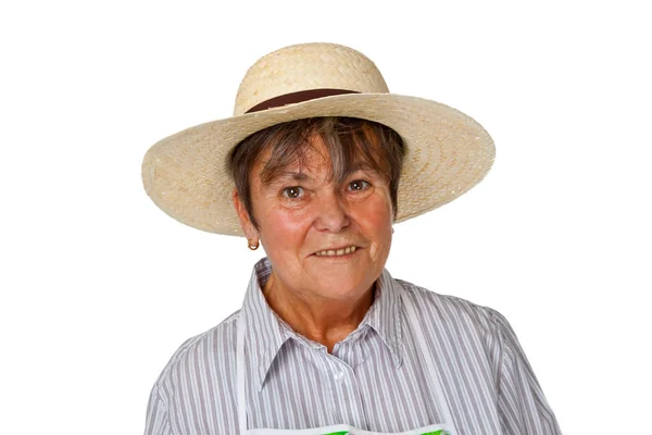 Femme senior avec chapeau de paille — Photo