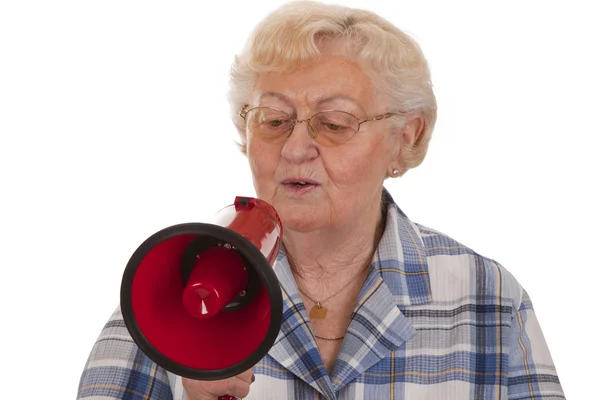 Female senior with megaphone — Stock Photo, Image