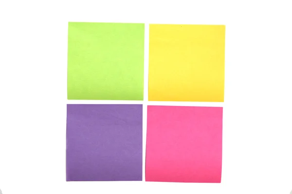 Four multi colored post it notes