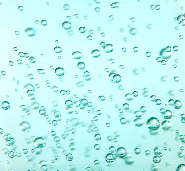 Прозорий бульбашки в синій Ларі — стокове фото