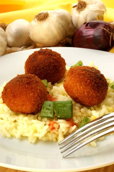 Rissole with organic rice on a plate — Stock Photo, Image