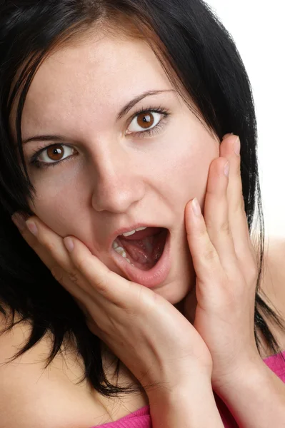 Egy szép fiatal nő tátott szájjal — Stock Fotó