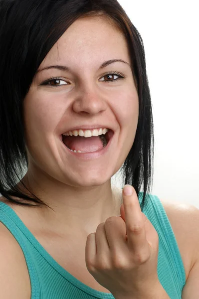Egy fiatal nő show lány ujjával — Stock Fotó