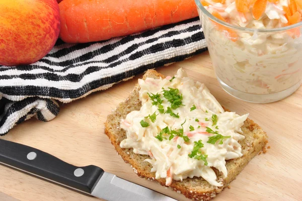 Home made coleslaw on bread with parsley Stock Picture