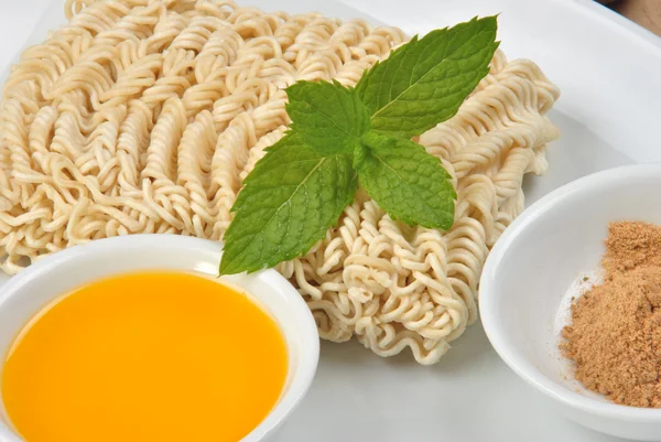 Home made noodle and some flavour powder — Stock Photo, Image