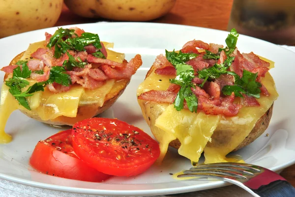 Grilled potato with some cheese and bacon — Stock Photo, Image